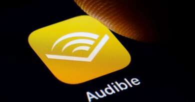 In this photo illustration the logo of Amazon Audible is displayed on a smartphone