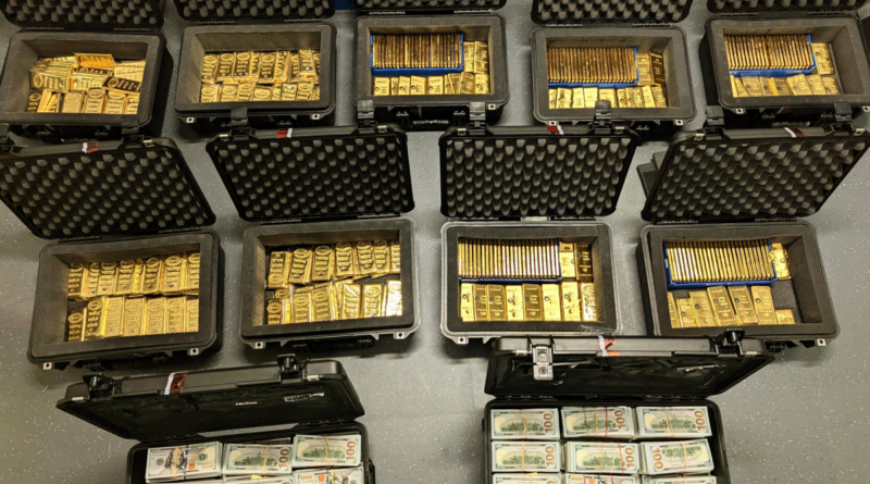 nine suitcases full of gold bars, and two suitcases full of 100-dollar cash bills, as a photo taken from above.