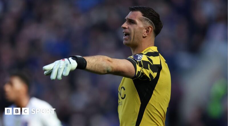 Chelsea goalkeeper Emiliano Martinez points