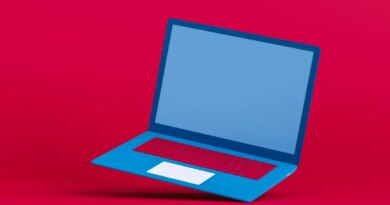 Blue laptop on a red background