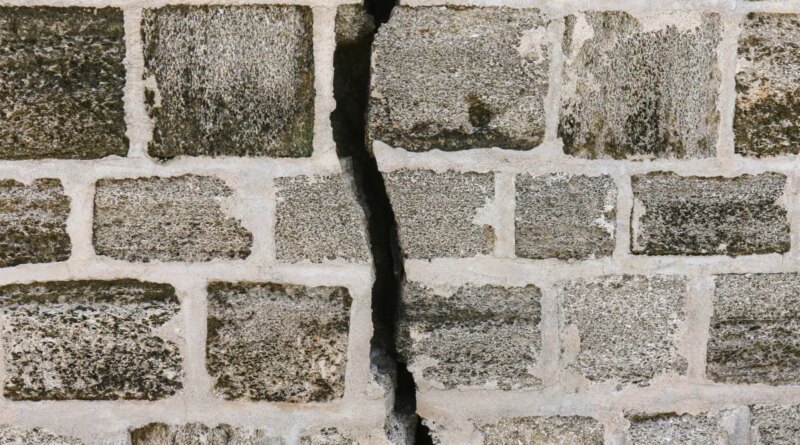 big crack in brick wall