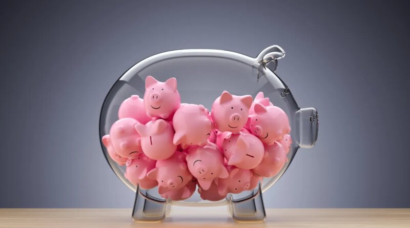glass piggy bank full of little pink piggies