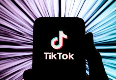 A smartphone displays the TikTok logo.