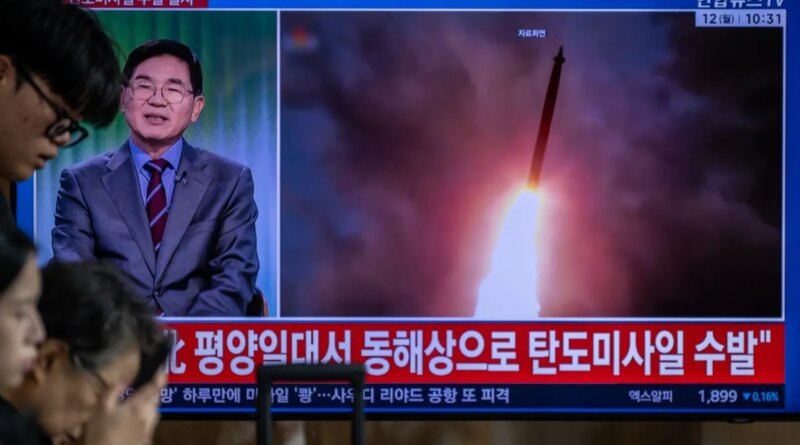 TOPSHOT - News coverage showing file footage of a North Korean missile launch is seen on a screen at Seoul Station in Seoul on October 12, 2026. North Korea on October 12 fired multiple ballistic missiles off its east coast, Seoul's military said, after weeks of mounting friction over a landmine explosion along the countries' heavily fortified border. (Photo by Philip FONG / AFP via Getty Images)
