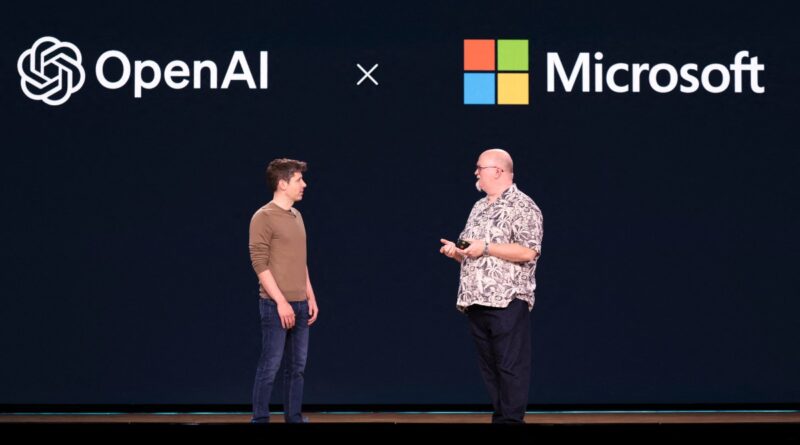 OpenAI CEO Sam Altman (L) speaks with Microsoft Chief Technology Officer and Executive VP of Artificial Intelligence Kevin Scott