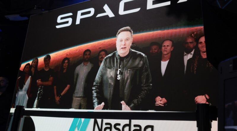 Elon Musk, founder and CEO of SpaceX, speaks via video before the ringing of opening bell at the Nasdaq Marketsite at the launch of the company's initial public offering (IPO) on June 12, 2026