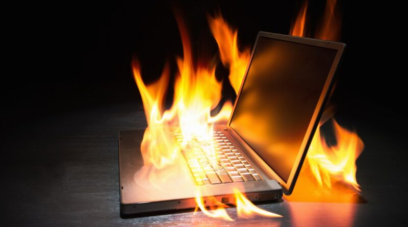 Laptop computer engulfed in flames