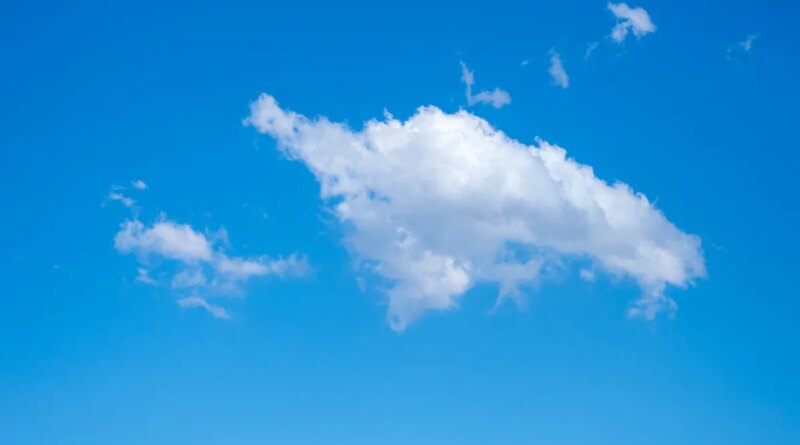 fluffy white cloud in a blue sky