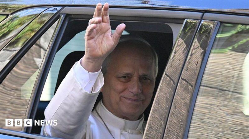 Pope Leo XIV waves from the window of a car as he leaves the Vatican before being admitted to Rome's Gemelli University Hospital for an operation to remove a lump from his lung.