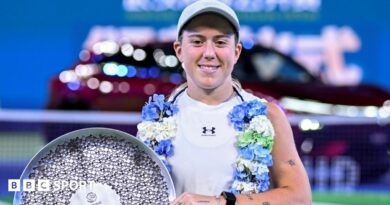 Sonay Kartal smiles as she poses with the Wuhan Open's runner-up trophy