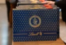 Swiss investors flex their wealth by carrying blue suitcases filled with 10 pounds of chocolate