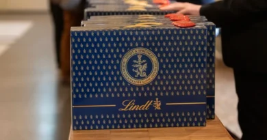 Swiss investors flex their wealth by carrying blue suitcases filled with 10 pounds of chocolate