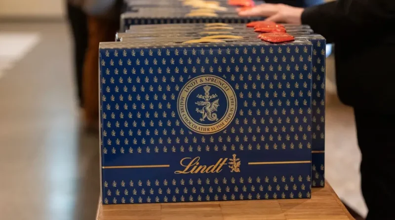 Swiss investors flex their wealth by carrying blue suitcases filled with 10 pounds of chocolate