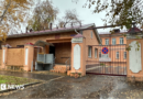 A view of the entrance to the grounds of the anti-plague institute in the Russian city of Irkutsk, with red-brick buildings visible behind a gate, 6 October 2026