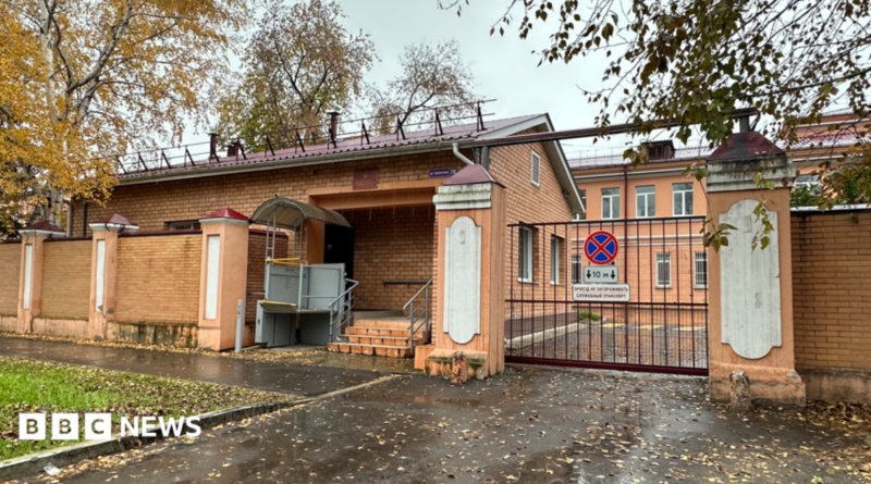 A view of the entrance to the grounds of the anti-plague institute in the Russian city of Irkutsk, with red-brick buildings visible behind a gate, 6 October 2026