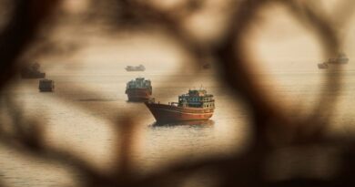 Two Singapore-registered vessels struck in Strait of Hormuz; one sinks