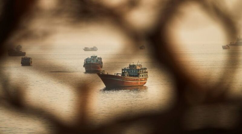 Two Singapore-registered vessels struck in Strait of Hormuz; one sinks