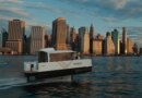 A hydrofoil ferry cruises near Manhattan.