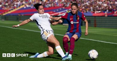 Oihane Hernandez of Real Madrid competes for the ball with Ona Batlle of FC Barcelona during a November 2023 Liga F match
