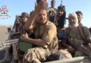 Yemeni government fighters recorded driving vehicles over Houthi opponents