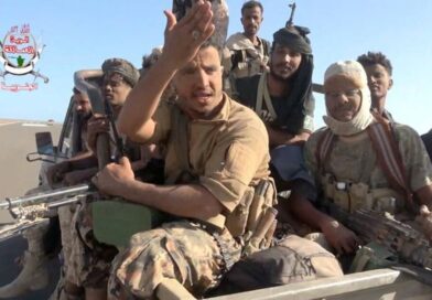 Yemeni government fighters recorded driving vehicles over Houthi opponents